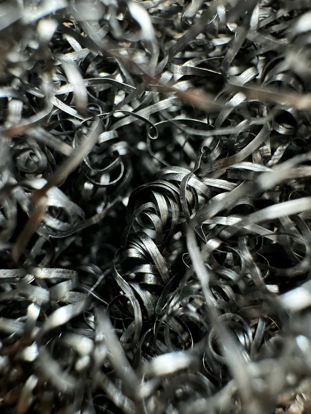 Aparas e fragmentos de aço inoxidável usinado, prontos para reciclagem